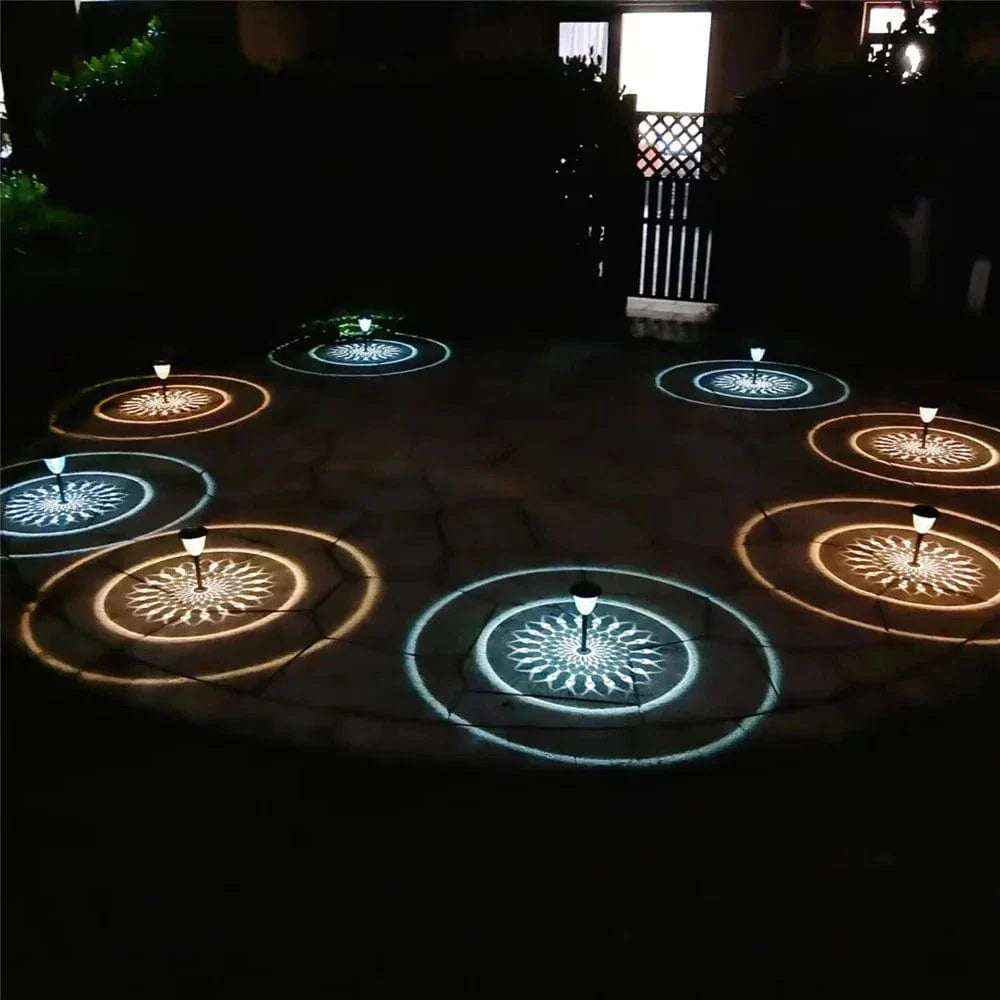Weatherproof garden light casting intricate mandala shadows, solar-powered, LED, IP65 waterproof, enhances outdoor decor.