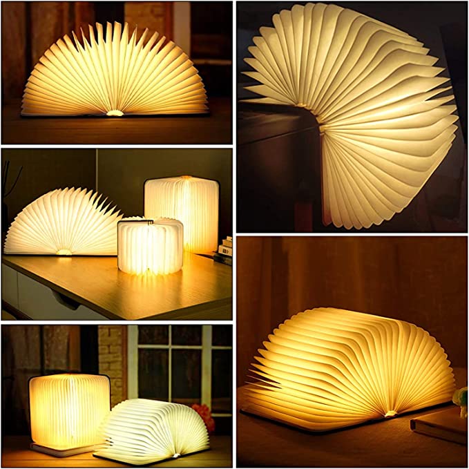 "Whimsical LED book lamp with warm glow, resembling an open book, perfect for cozy decor in bedrooms or study areas."