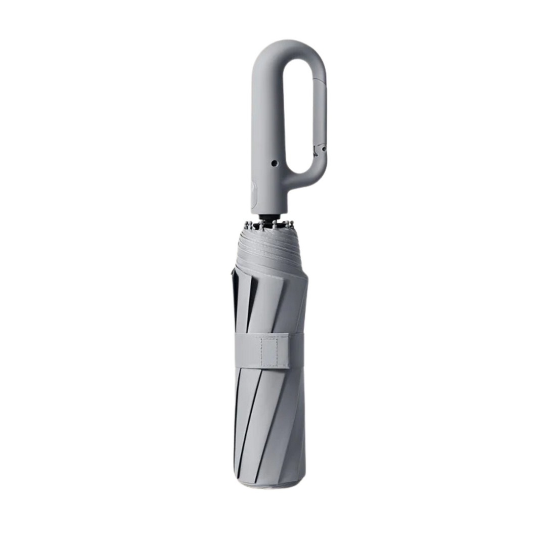 "Windproof automatic folding umbrella with reflective strip, featuring 10-rib construction, reverse folding, and carabiner ha