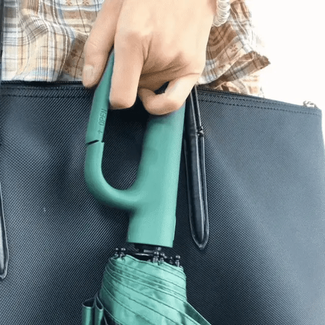 "Windproof automatic folding umbrella with reflective strip, featuring 10-rib construction, reverse folding, and carabiner ha