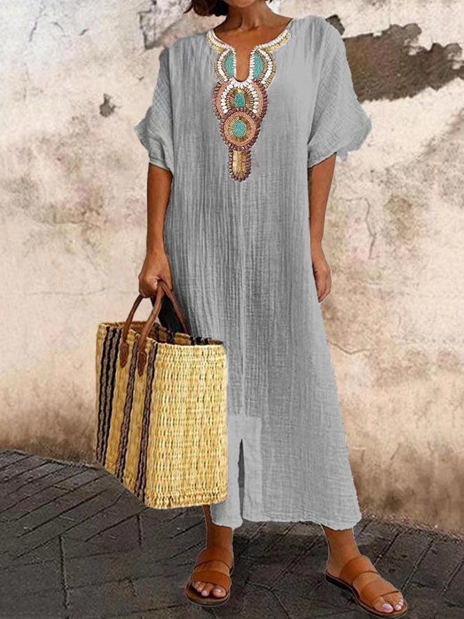 Women's airy kaftan dress in light blue, flowing silhouette, perfect for summer elegance and comfort, versatile styling.