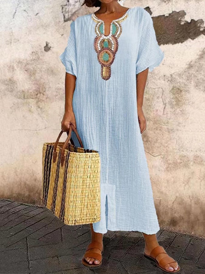 Women's airy kaftan dress in light blue, flowing silhouette, perfect for summer elegance and comfort, versatile styling.