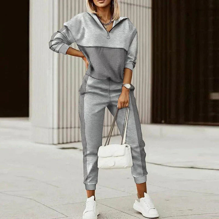 Women's athleisure set with zip hoodie and joggers, featuring a chic patterned design in cosy, breathable fabric.