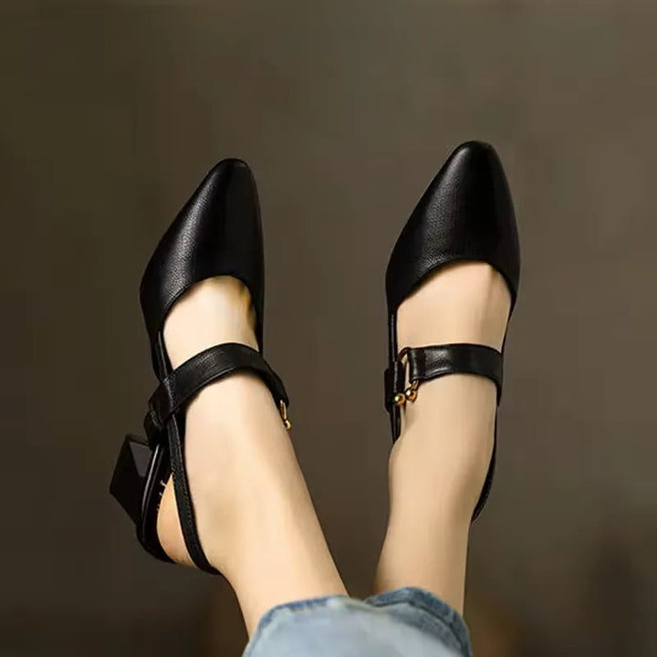 "Women's beige orthopedic high heels with wide base, offering support and style for comfort and confidence all day."