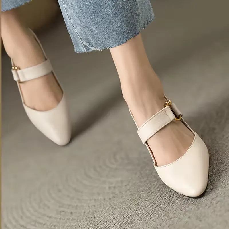 "Women's beige orthopedic high heels with wide base, offering support and style for comfort and confidence all day."