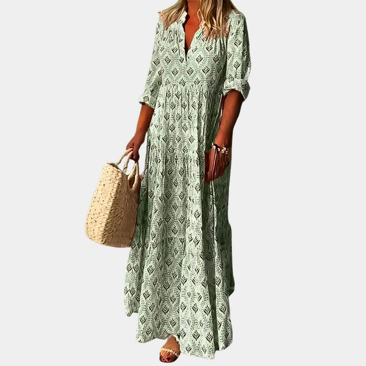 "Women's Boho Maxi Dress in Pink, featuring elbow-length sleeves and a unique collar, perfect for chic and casual occasions."