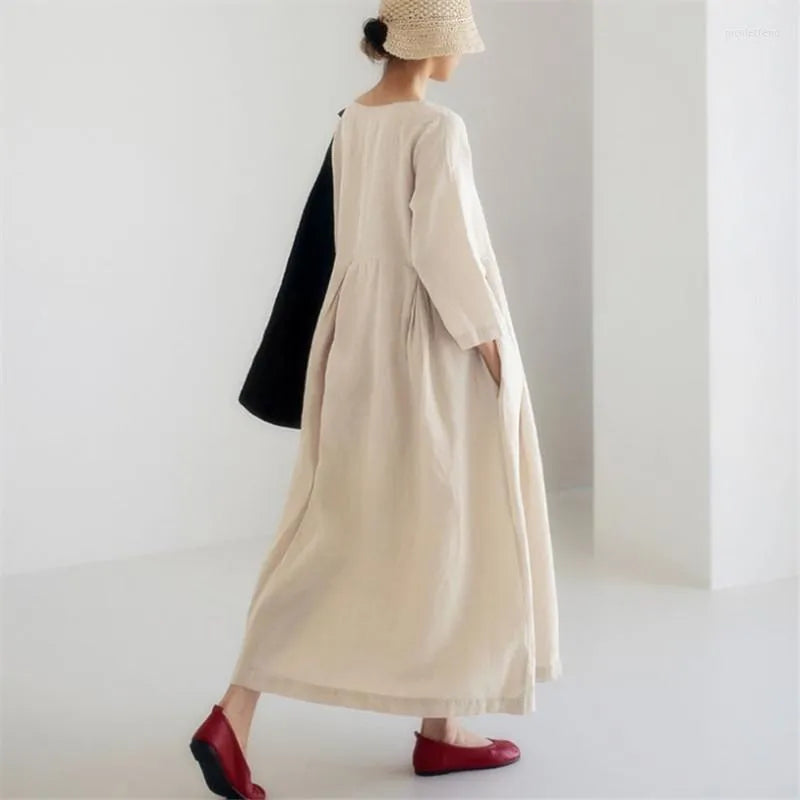 "Women's breathable cotton blend casual dress, relaxed fit, minimalist design, perfect for everyday comfort and style."