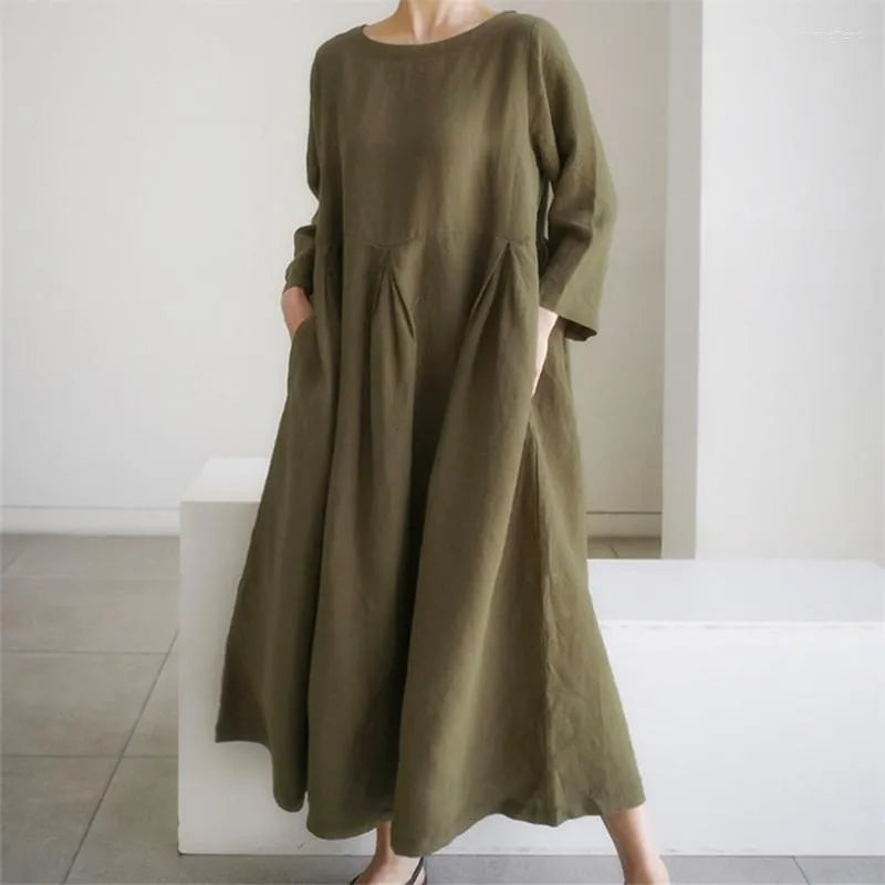 "Women's breathable cotton blend casual dress, relaxed fit, minimalist design, perfect for everyday comfort and style."