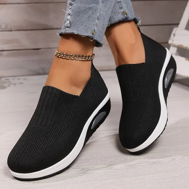 Women's breathable slip-on sneakers with cushioned sole, featuring lightweight mesh upper for cool, everyday comfort.