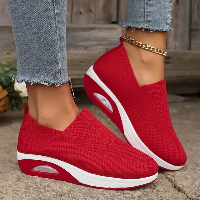 Women's breathable slip-on sneakers with cushioned sole, featuring lightweight mesh upper for cool, everyday comfort.