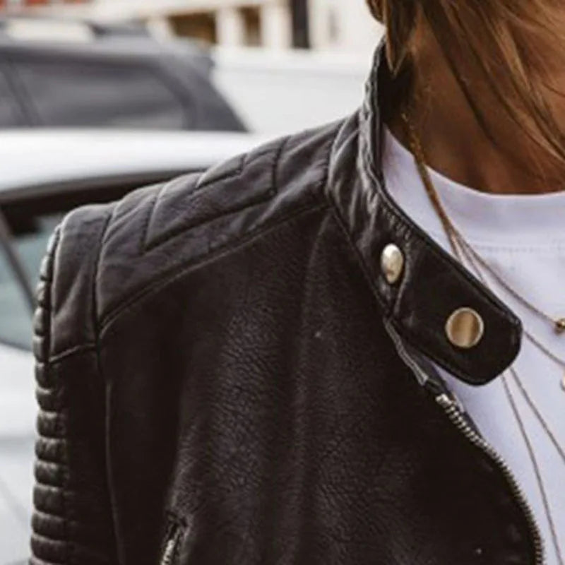 Women's casual black vegan leather biker jacket with long sleeves and chic style, perfect for sustainable fashion.
