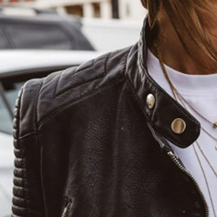 Women's casual black vegan leather biker jacket with long sleeves and chic style, perfect for sustainable fashion.
