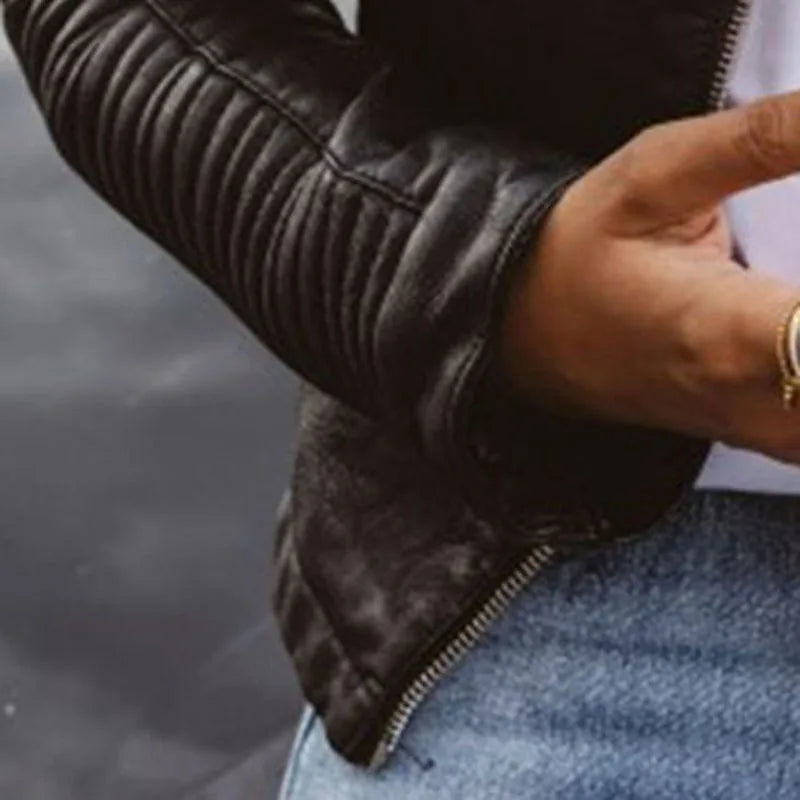 Women's casual black vegan leather biker jacket with long sleeves and chic style, perfect for sustainable fashion.