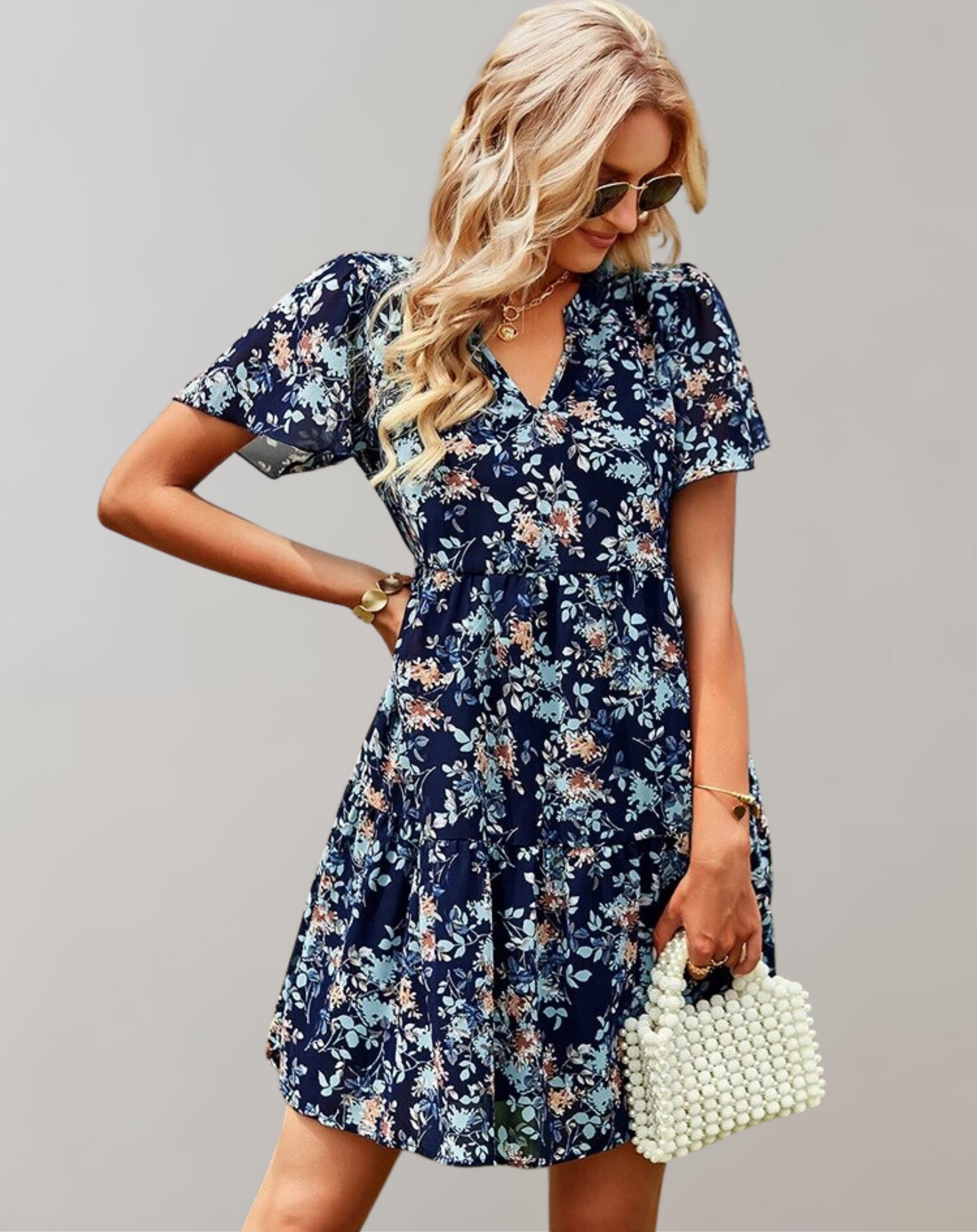 Women's casual V-neck floral midi dress, vibrant spring/summer print, loose fit, versatile style, sleeveless option