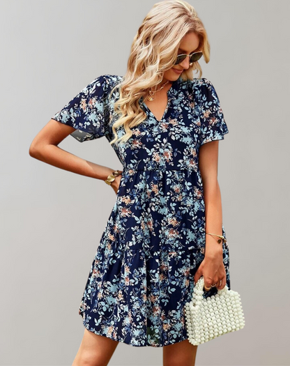 Women's casual V-neck floral midi dress, vibrant spring/summer print, loose fit, versatile style, sleeveless option