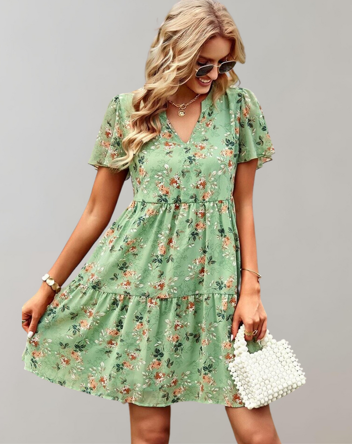 Women's casual V-neck floral midi dress, vibrant spring/summer print, loose fit, versatile style, sleeveless option