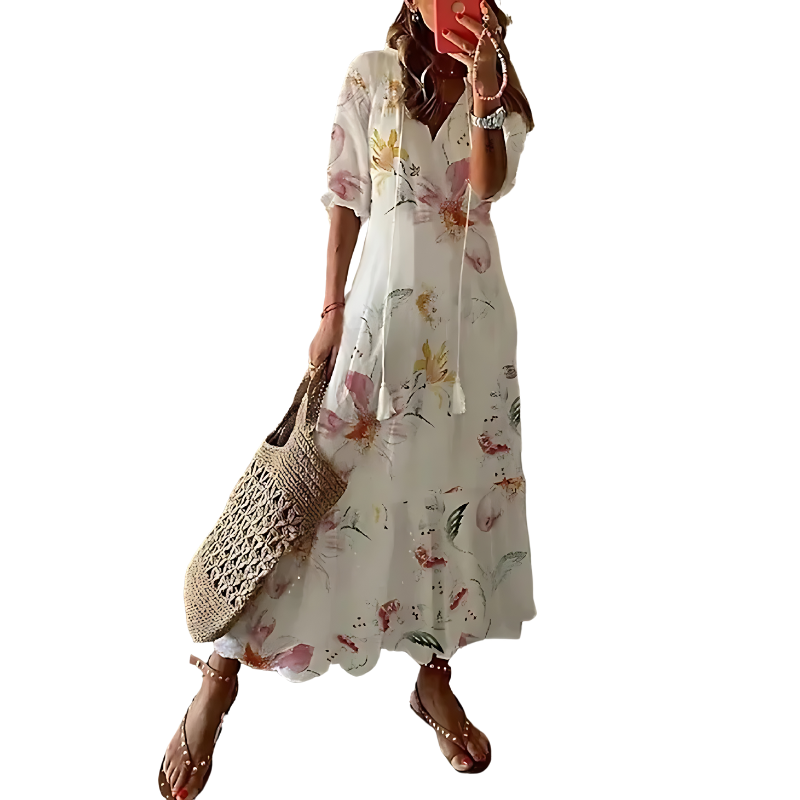 "Women's chic bohemian long dress in vibrant colors, ideal for beachwear with floral patterns and flowing silhouette."