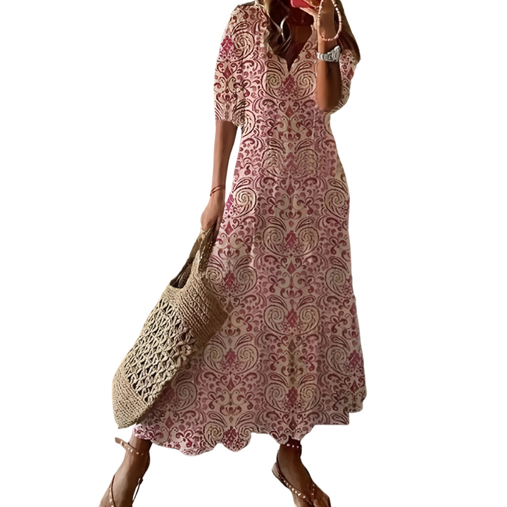 "Women's chic bohemian long dress in vibrant colors, ideal for beachwear with floral patterns and flowing silhouette."