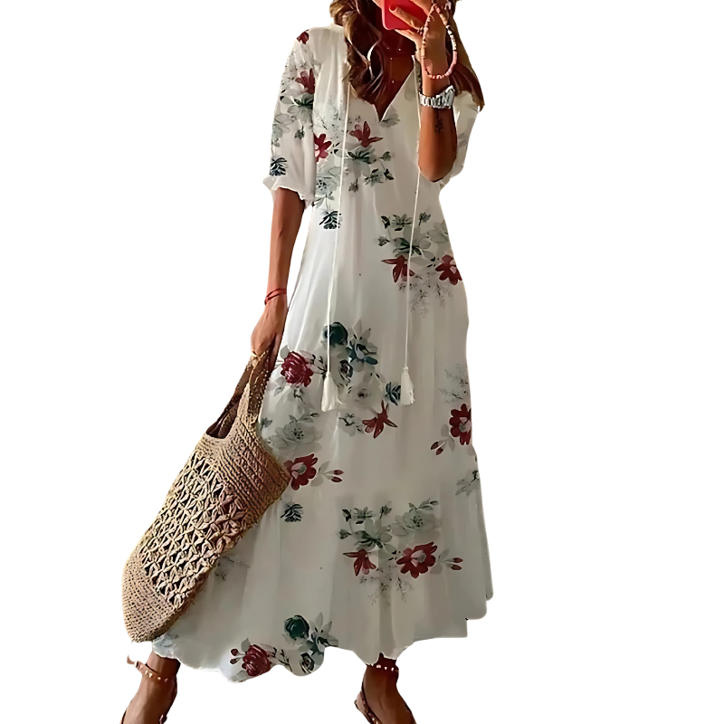 "Women's chic bohemian long dress in vibrant colors, ideal for beachwear with floral patterns and flowing silhouette."