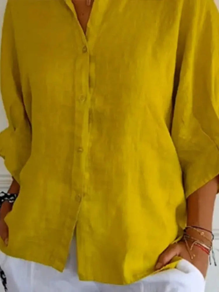 Women's chic linen blouse with relaxed fit, lightweight fabric, and elegant style, perfect for warm weather comfort.