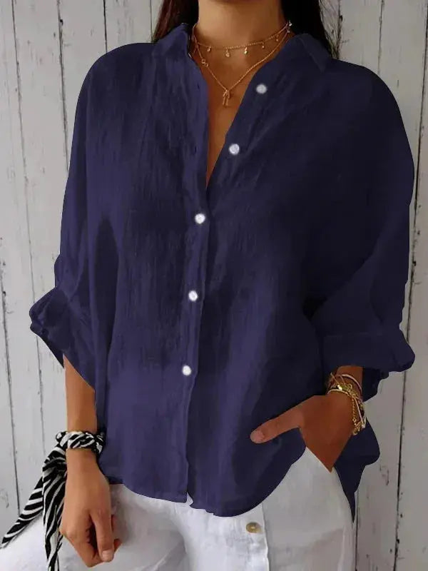 Women's chic linen blouse with relaxed fit, lightweight fabric, and elegant style, perfect for warm weather comfort.