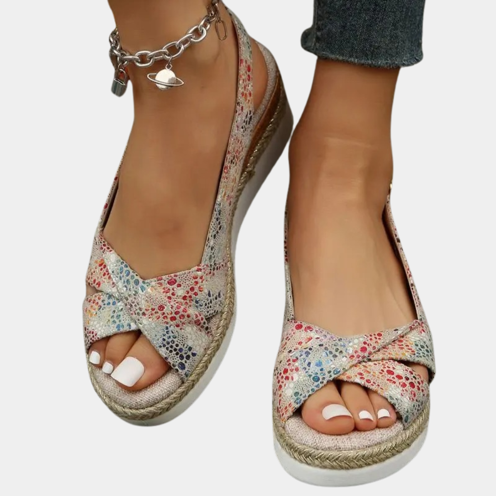 Women's cotton espadrille flats with multicolor pattern, breathable upper, and durable sole for comfort and style.