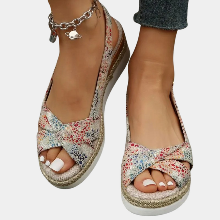 Women's cotton espadrille flats with multicolor pattern, breathable upper, and durable sole for comfort and style.