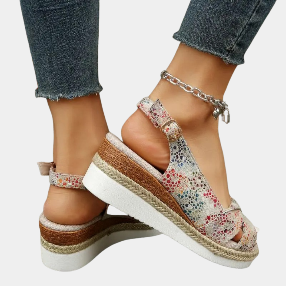 Women's cotton espadrille flats with multicolor pattern, breathable upper, and durable sole for comfort and style.