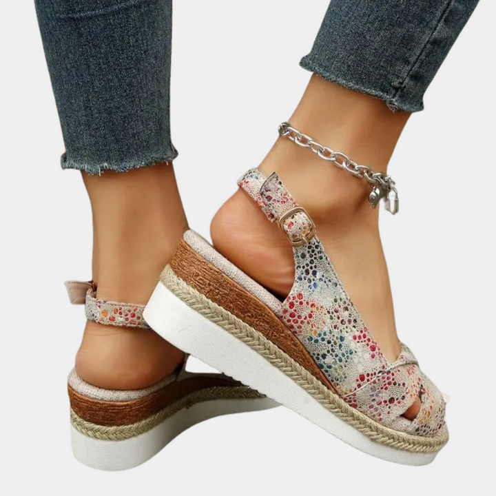 Women's cotton espadrille flats with multicolor pattern, breathable upper, and durable sole for comfort and style.