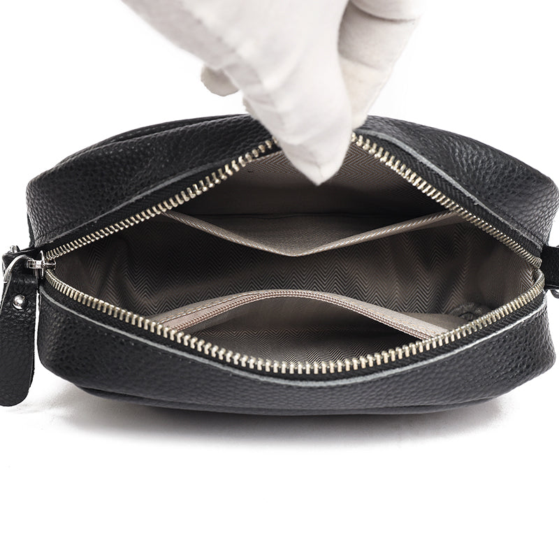 "Women's elegant beige leather crossbody bag with pebbled texture and adjustable strap, perfect for versatile fashion styling