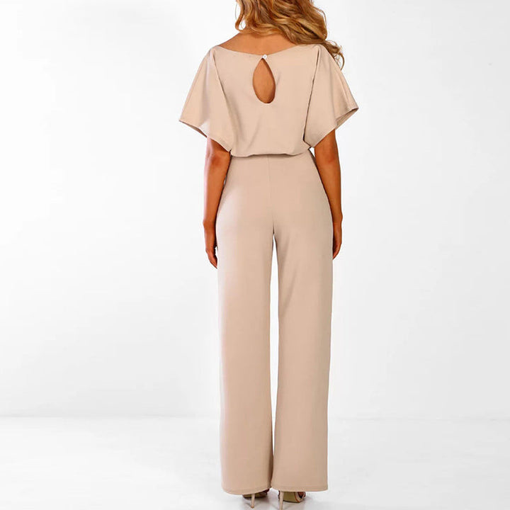 "Women's elegant belted jumpsuit, available in beige, black, blue. Features sleek design, versatile for any occasion."