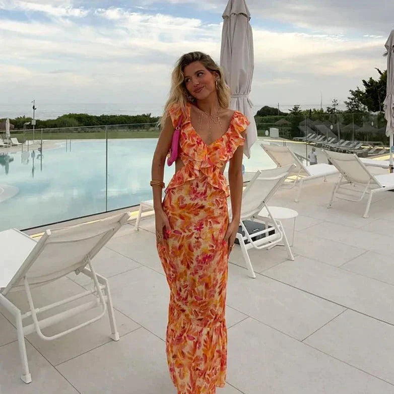 Women's elegant ruffled maxi dress with batwing sleeves, featuring bohemian charm, a V-neckline, and a flowing silhouette.