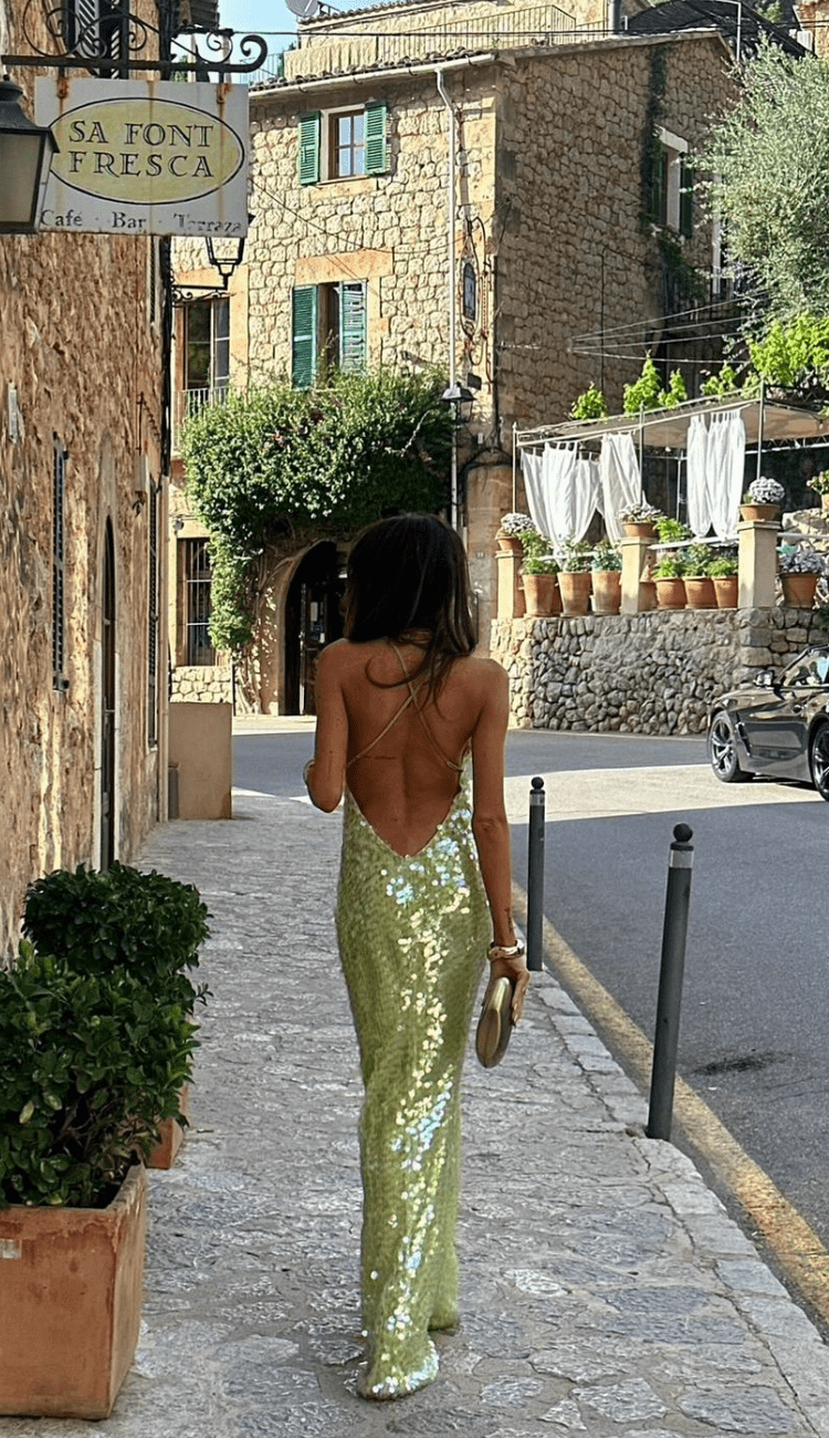 Women's elegant sequin maxi dress with all-over sequins, sleeveless design, ideal for formal occasions, flattering silhouette