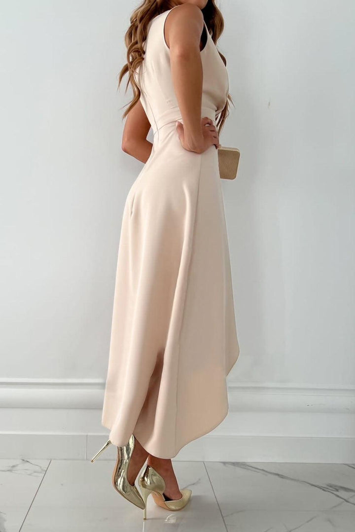 Women's elegant V-neck wrap maxi dress with asymmetrical hem, showcasing a refined silhouette and modern style.