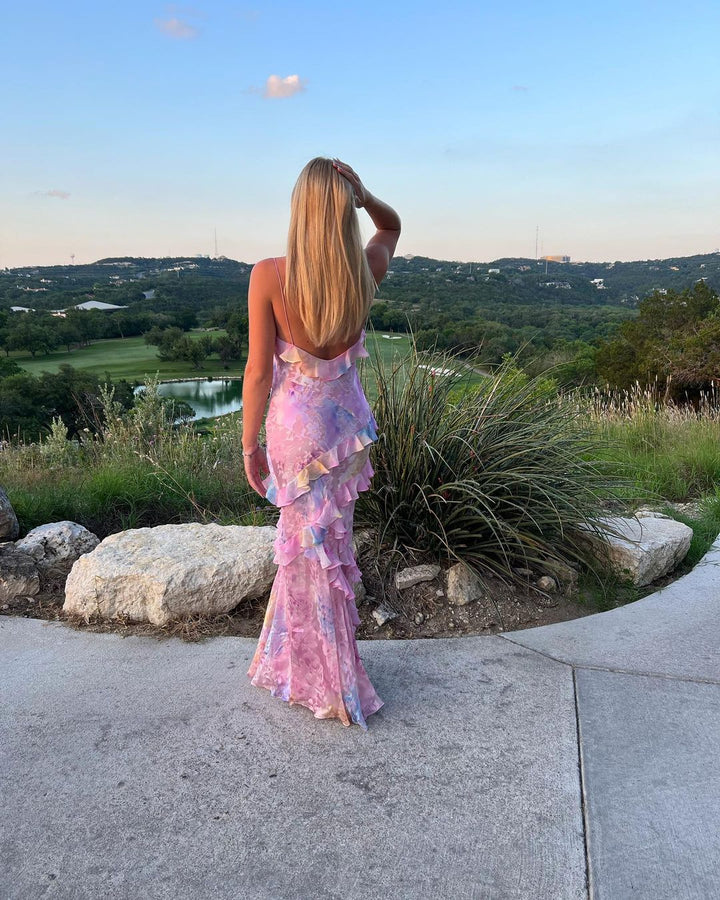 "Women's ethereal ruffle maxi dress, romantic flowing design, airy ruffles, open-back detail, soft romantic hues for elegance