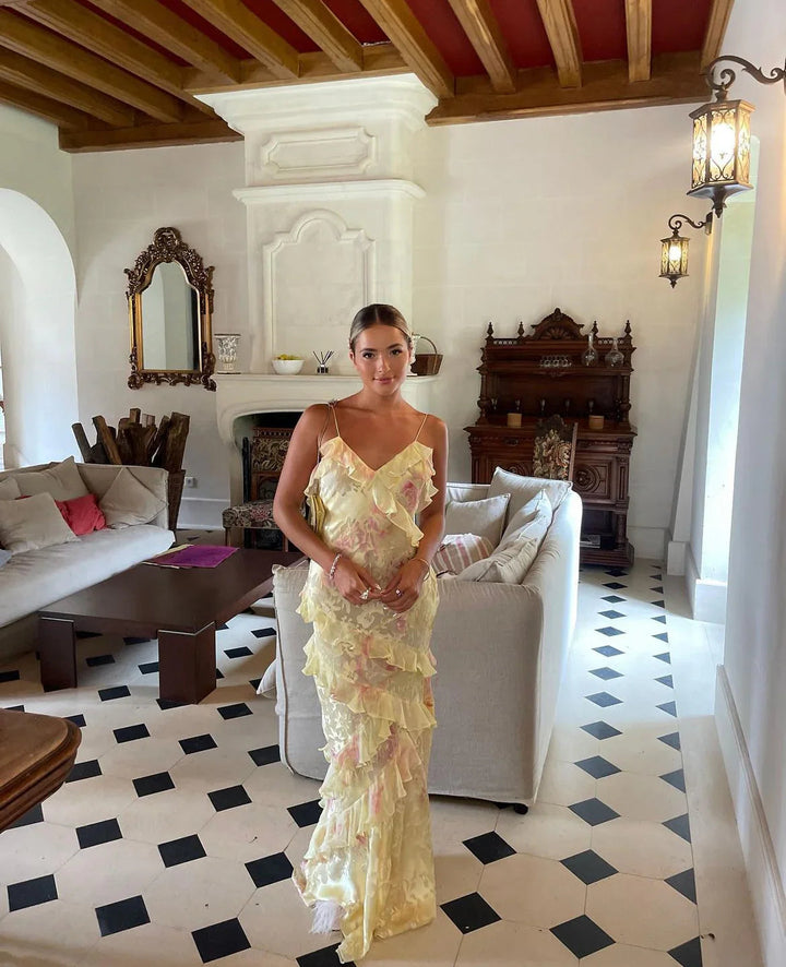 "Women's ethereal ruffle maxi dress, romantic flowing design, airy ruffles, open-back detail, soft romantic hues for elegance