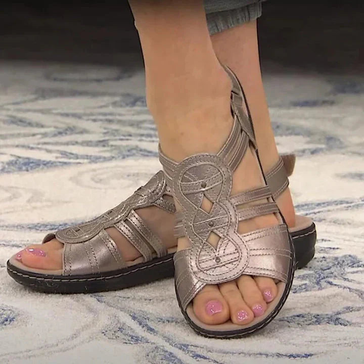 "Women's flat sandals with multi-strap design, soft cushioned sole, ideal for wide feet, available in various colors."
