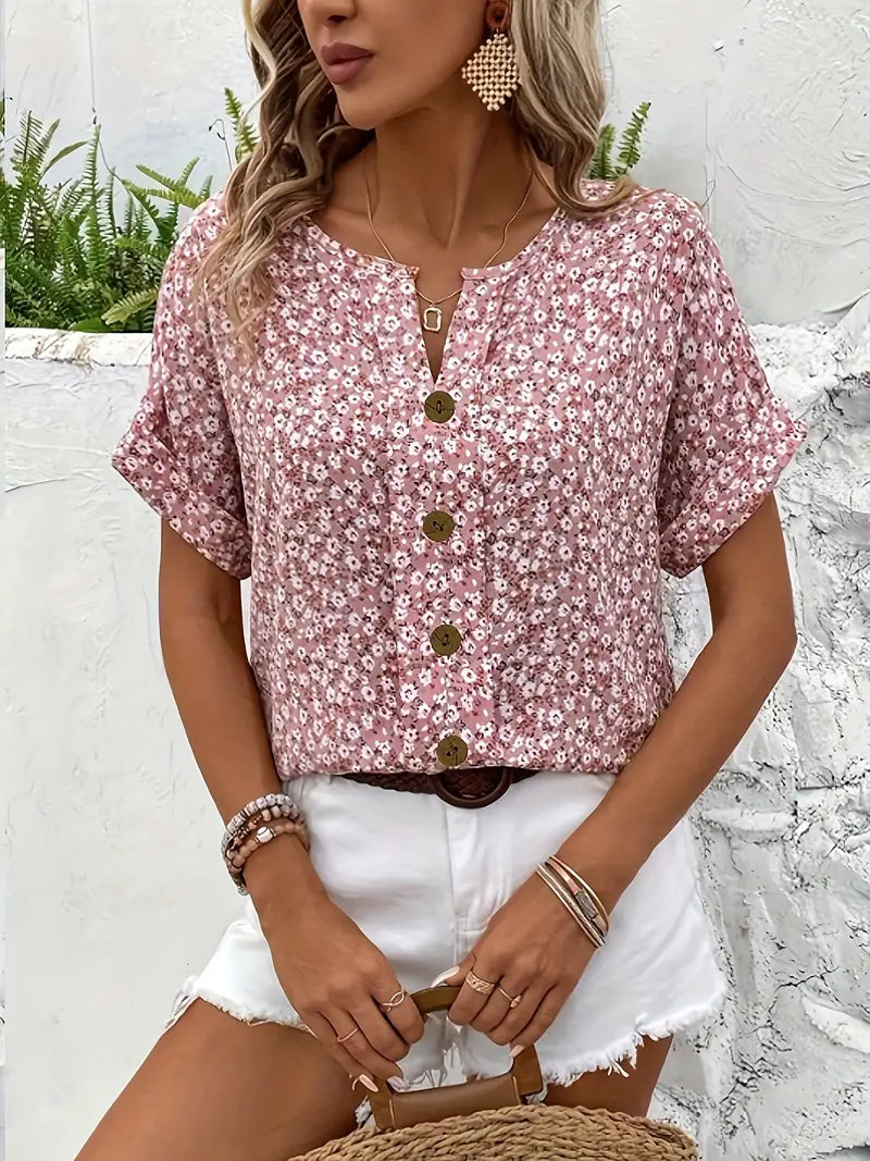 "Women's floral button-front casual blouse, short-sleeve, loose fit, charming print ideal for sunny days, versatile style."
