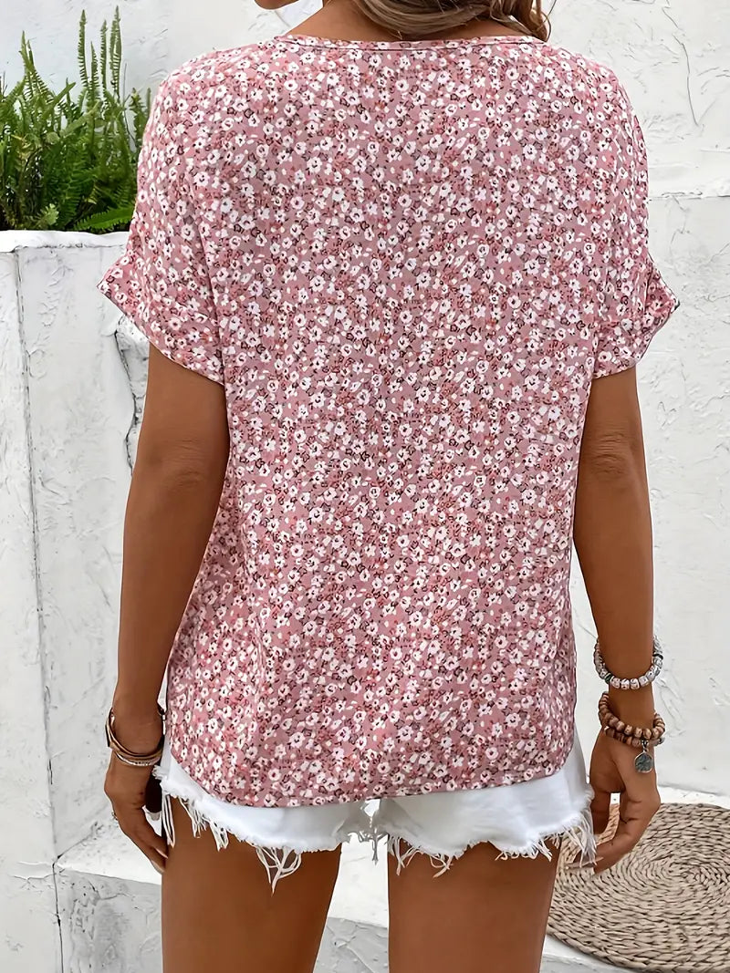 "Women's floral button-front casual blouse, short-sleeve, loose fit, charming print ideal for sunny days, versatile style."