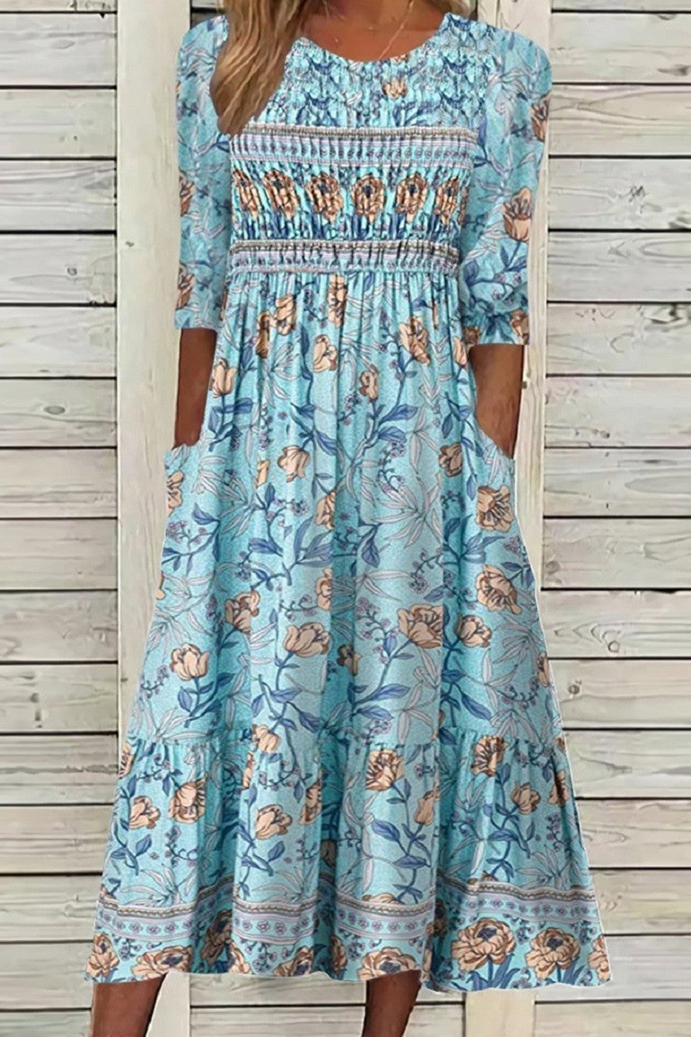 "Women's floral midi dress, relaxed fit, graphic print, breathable fabric, ideal for spring or summer outings, half sleeves."