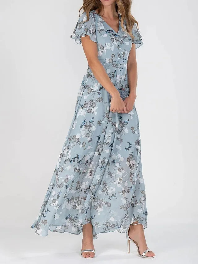 "Women's floral print maxi dress with V-neck, flutter sleeves, and flowy silhouette perfect for garden parties or weddings."