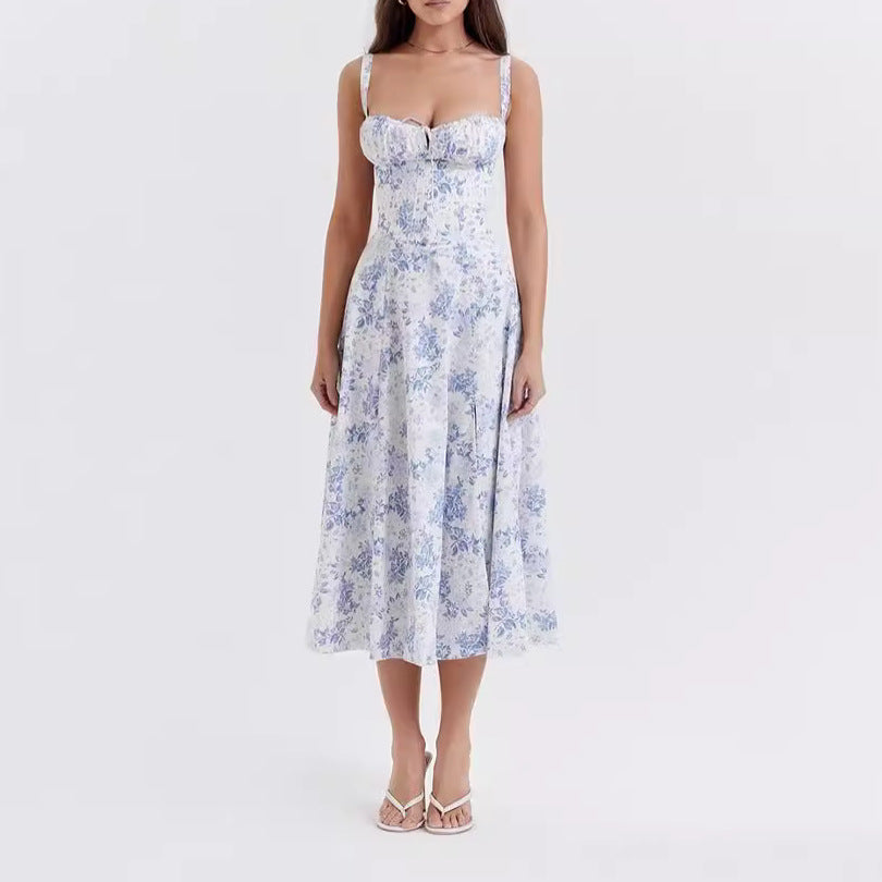 "Women's floral print sleeveless midi dress with tie front, chic design with flared fit, perfect for sunny days."