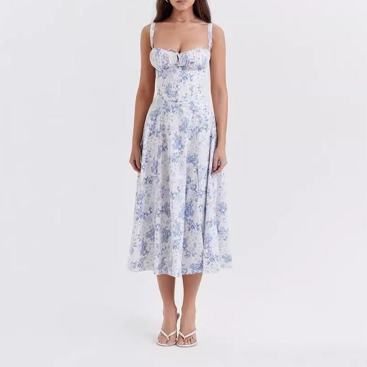 "Women's floral print sleeveless midi dress with tie front, chic design with flared fit, perfect for sunny days."