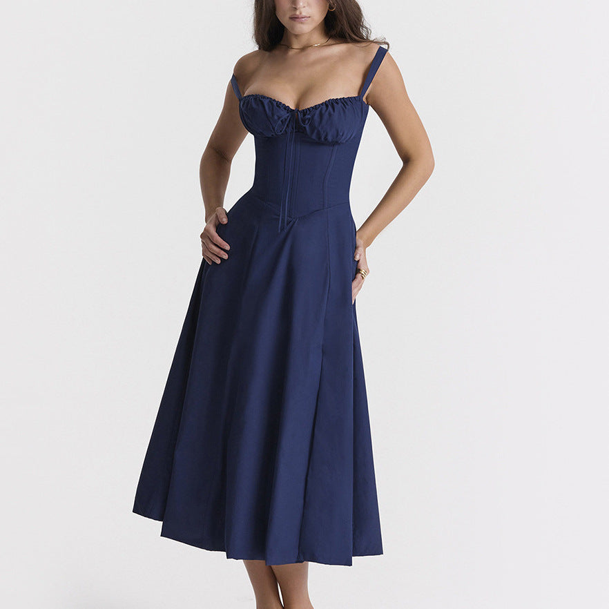 "Women's floral print sleeveless midi dress with tie front, chic design with flared fit, perfect for sunny days."