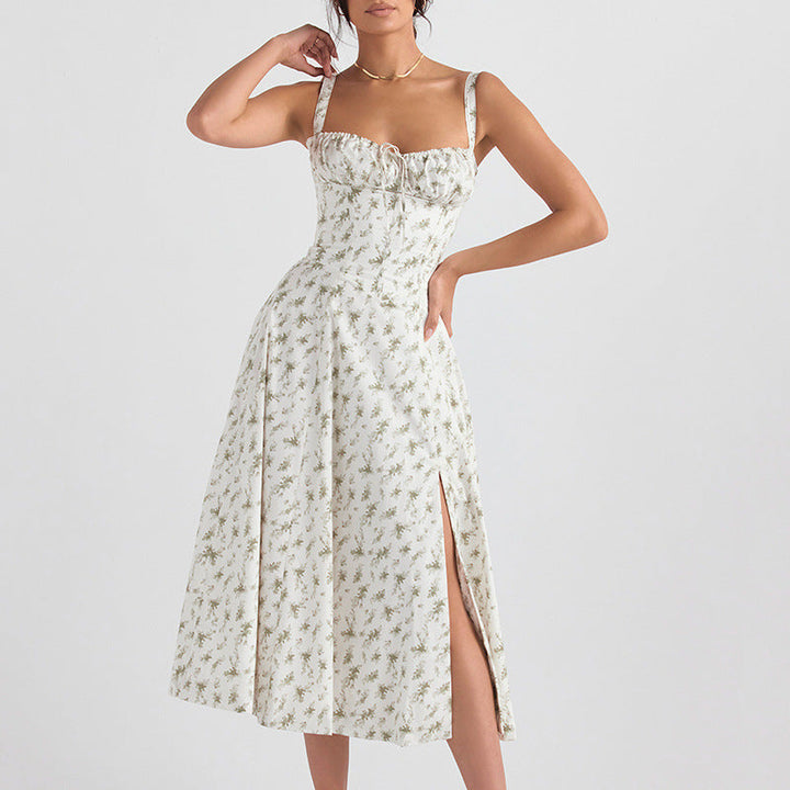 "Women's floral print sleeveless midi dress with tie front, chic design with flared fit, perfect for sunny days."