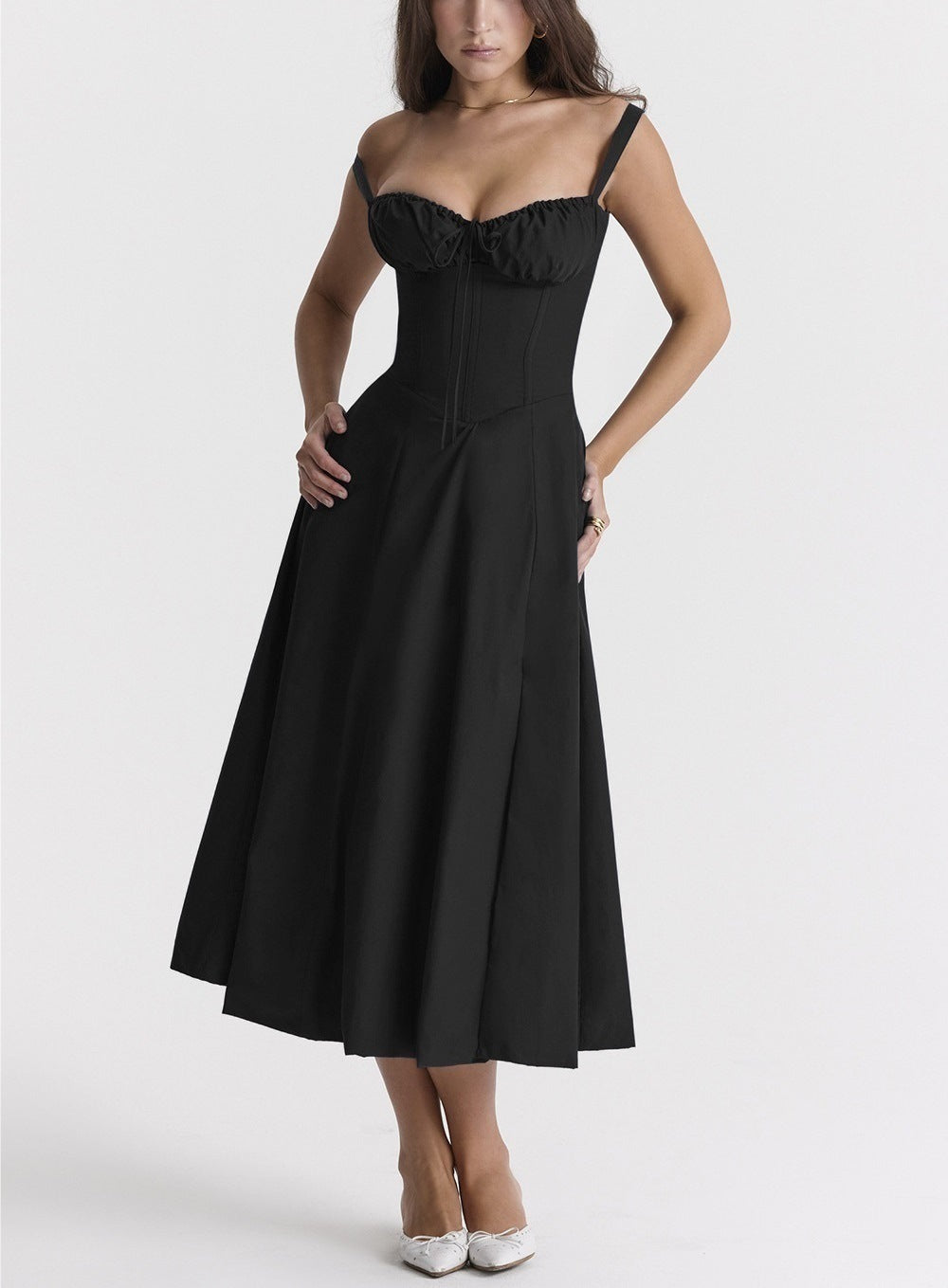 "Women's floral print sleeveless midi dress with tie front, chic design with flared fit, perfect for sunny days."