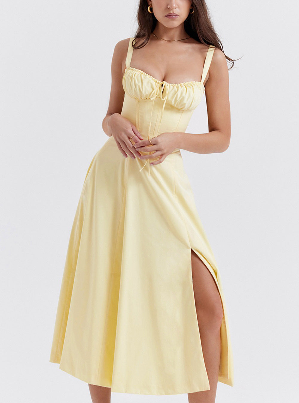 "Women's floral print sleeveless midi dress with tie front, chic design with flared fit, perfect for sunny days."