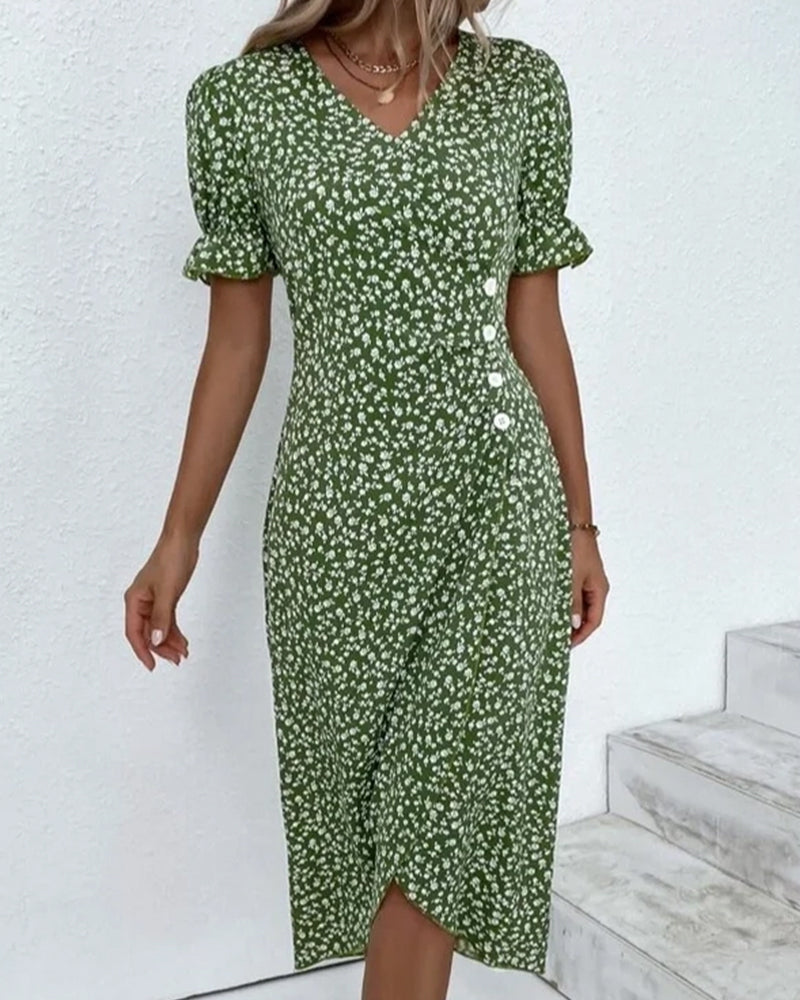 Women's floral wrap-style midi dress with V-neck and puff sleeves, perfect for warm days and stylish outings.
