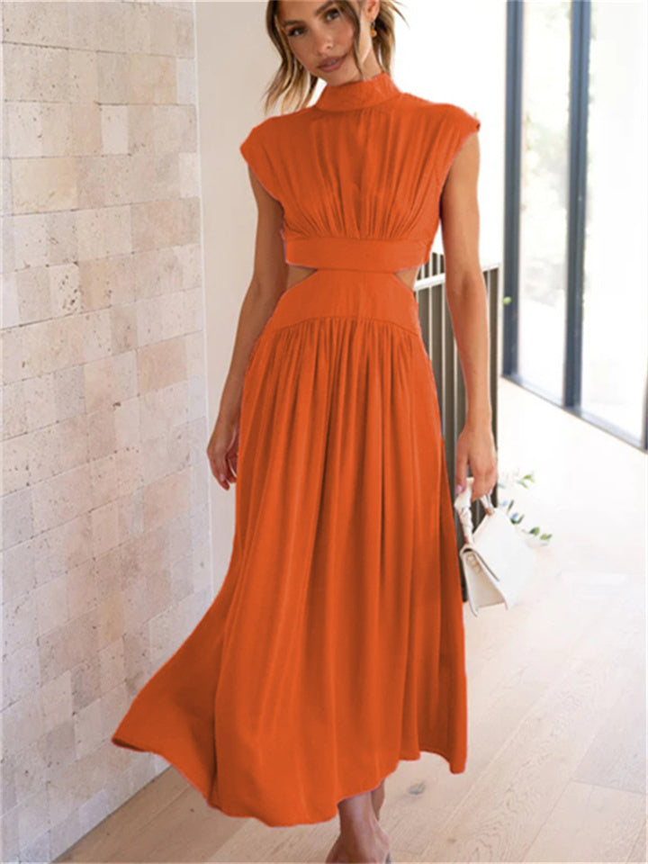 "Women's flowy summer Vespera dress, lightweight and elegant, showing a flattering silhouette for chic sunny day style."