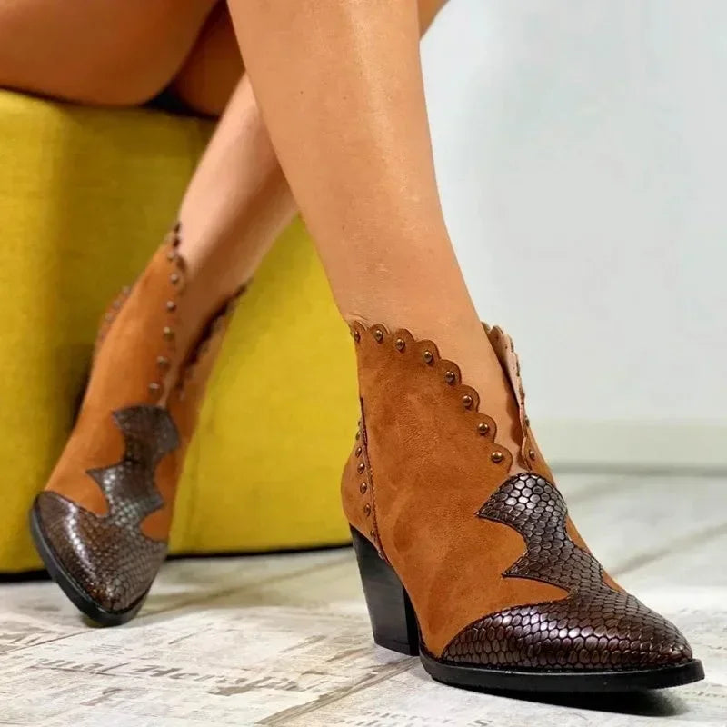 "Women's genuine leather lace-up cowboy boots with a classic Western design, pointed toe, and traditional silhouette."